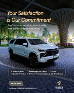 A white luxury SUV parked under a modern wooden canopy outside a building, perfect for Cancun luxury transportation