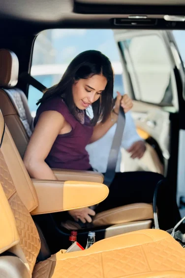 woman securing her belt